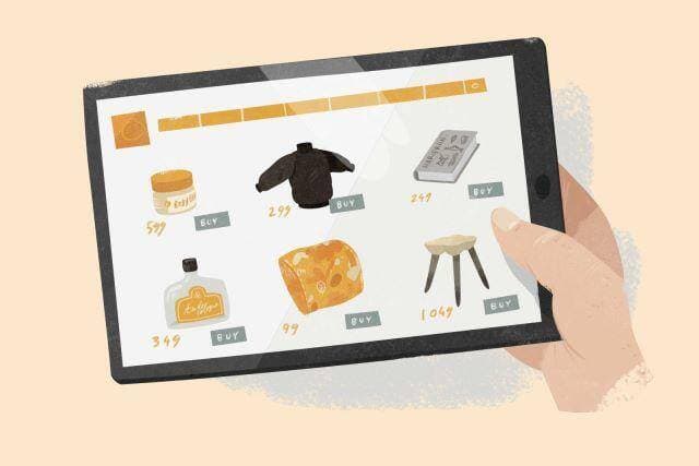 Shopping af tøj på en tablet.